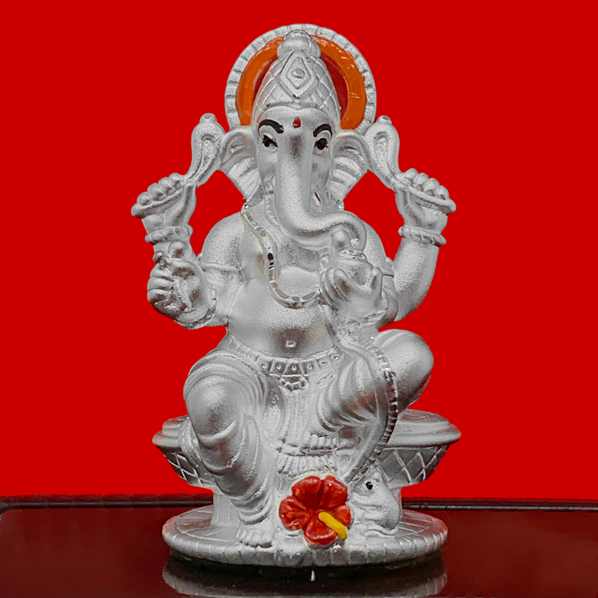 999 Pure Silver Ganesha Idol with Scarlet and Yellow Flower in Rectang ...